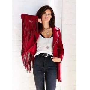 Red suede jacket with fringe.